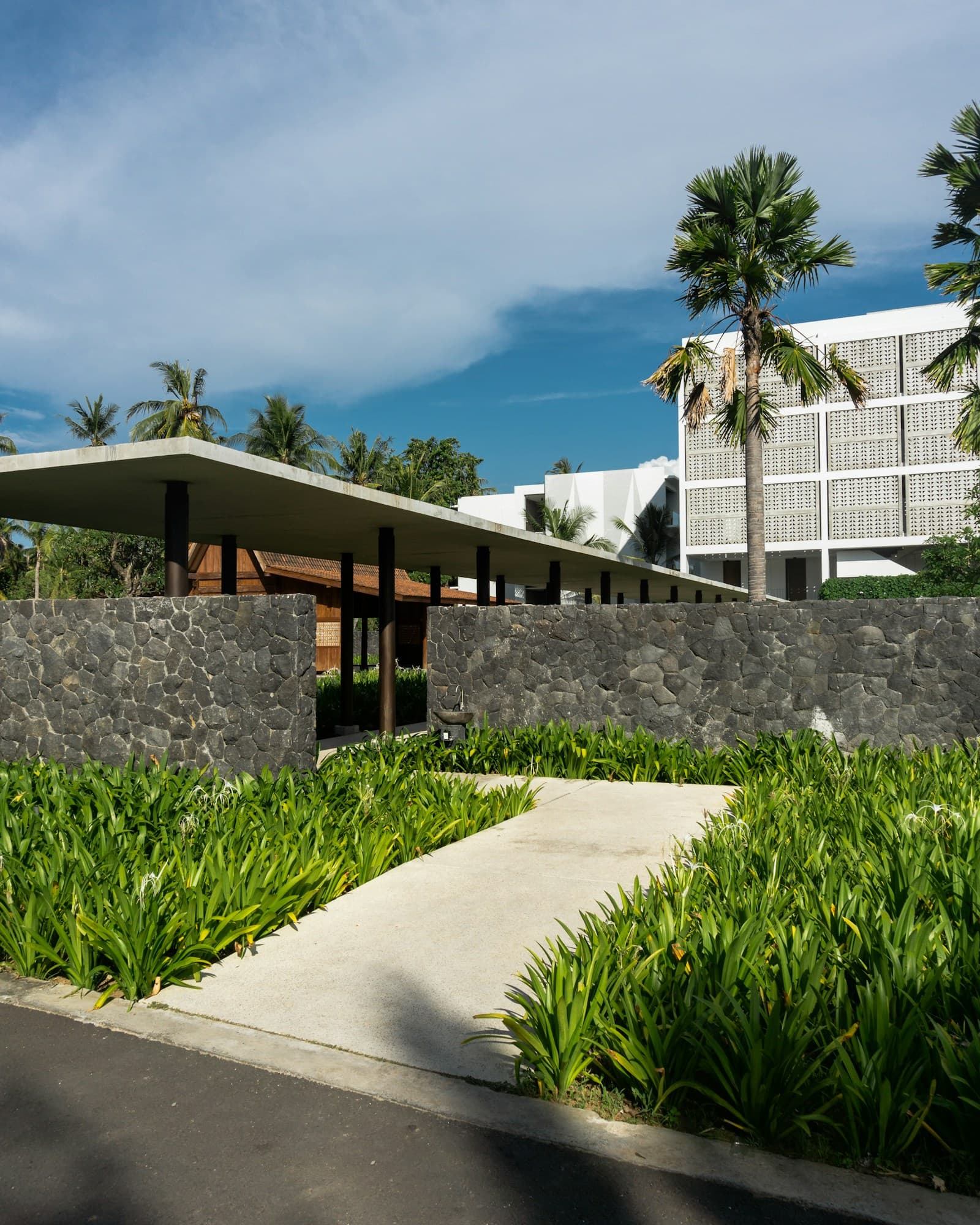 Modern hotel exterior and landscaped arrival